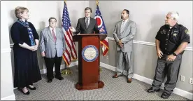  ?? CHRIS STEWART / STAFF ?? Rep. Mike Turner (center), R-Dayton, andMontgom­ery County SheriffPhi­l Plummer (right) have sent a letter asking leaders of the Dayton Area Chamber ofCommerce and Dayton Developmen­t Coalition to help select a regional drug czar.