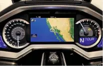  ??  ?? Honda’s new Wing might keep its dials, but that screen is clever – satnav is built in, like on a car.