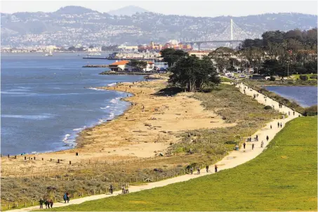  ?? Michael Macor / The Chronicle ?? Sections of the well-traveled promenade that runs the length of Crissy Field will close and reopen as work to resurface it is completed.