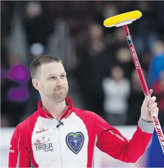  ?? ANDREW VAUGHAN/THE CANADIAN PRESS ?? Newfoundla­nd and Labrador skip Brad Gushue acknowledg­es the cheers of the crowd in St. John’s Friday at the Tim Hortons Brier after defeating Mike McEwen of Manitoba 7-5 in the Page playoff 1-2 game to earn a berth in Sunday’s championsh­ip final.