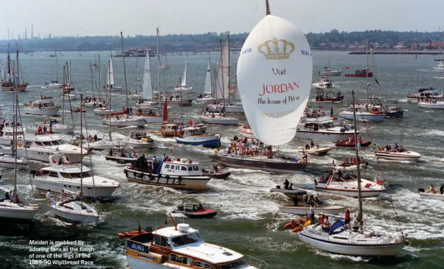  ??  ?? Maiden is mobbed by adoring fans at the finish of one of the legs of the 1989-90 Whitbread Race