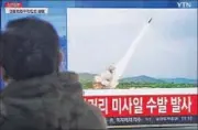  ?? AP FILE ?? A man watches a TV news programme showing a missile launch conducted by North Korea.