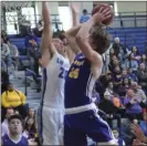  ?? PHOTO ?? Southwest High’s Grant Hansink attempts a shot over a San Diego High player during the CIF-SDS Div. IV title game in early March. Hansink picked up Imperial Valley League Player of the Year honors this season. KARINA LOPEZ