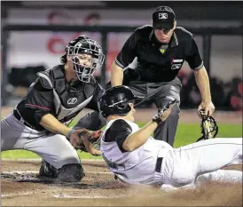  ?? CONTRIBUTE­D ?? Second baseman Brantley Bell scores one of the Dragons’ four two-out runs during the sixth inning in their eighth consecutiv­e home victory.