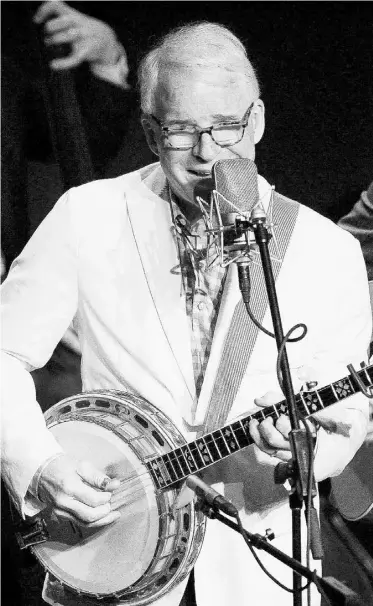  ?? MARIO ANZUONI, REUTERS ?? Comedian Steve Martin, who has establishe­d a second career as a bluegrass player, performs in Los Angeles in this file photo. Martin and his band, the Steep Canyon Rangers, played the Jubilee Auditorium on Sunday night.