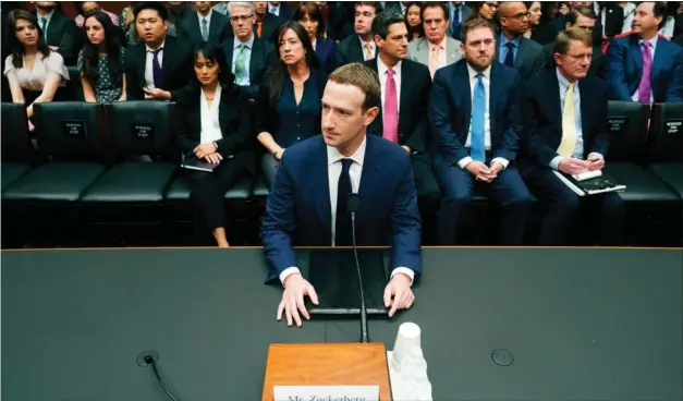  ?? FOTO: ANDREW HARNIK/AP ?? Sådan kommer man ikke til at se Mark Zuckerberg i det britiske parlament, der i dag holder en høring om Facebook og dets mange datalaek. Han holder sig vaek og sender i stedet en underordne­t til at forklare og undskylde for sig.