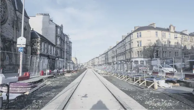  ?? ?? ↑ Progress on the Edinburgh tram works on Leith Walk in February. The tracks are now in on parts of the route from York Place to Ocean Terminal