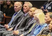  ?? Bonnie Cash/bloomberg ?? President Joe Biden and House Speaker Kevin Mccarthy, R-caif., second from left, appeared together Thursday at the National Prayer Breakfast at the Capitol.