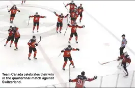  ?? The Associated Press ?? Team Canada celebrates their win in the quarterfin­al match against Switzerlan­d.