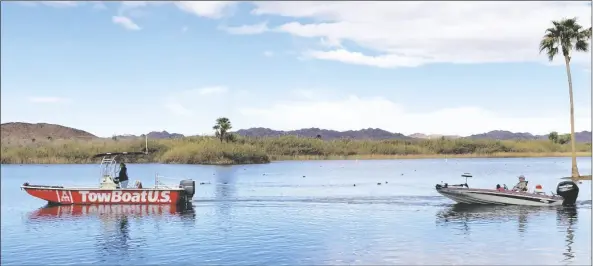  ?? PHOTO COURTESY OF TOWBOATUS ?? TOWBOATUS FISHER’S LANDING is ready to assist boaters 24/7 with profession­al on water towing, soft ungroundin­g, battery jump and fuel drop off services.