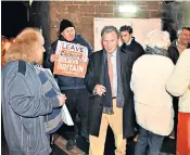  ??  ?? Sir Oliver Letwin faces protesters at his Conservati­ve associatio­n in west Dorset over moves to delay Brexit
