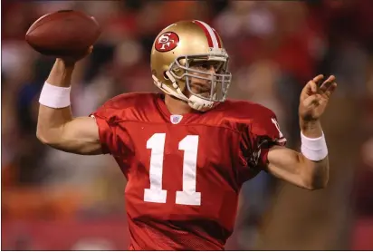  ?? JED JACOBSOHN — GETTY IMAGES, 2019 ?? Former 49ers quarterbac­k Alex Smith passes against the Cardinals during a September 2007 game at Monster Park in San Francisco. Smith and the Washington Football Team will play the 49ers on Sunday at State Farm Stadium in Glendale, Ariz.