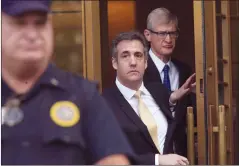  ?? AP PHOTO MARY ALTAFFER ?? Michael Cohen leaves Federal court Tuesday in New York. Cohen, has pleaded guilty to charges including campaign finance fraud stemming from hush money payments to porn actress Stormy Daniels and ex-Playboy model Karen McDougal.