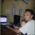  ?? INDAH NURUL HIDAYAH — ARIA KHRISNA VIA ASSOCIATED PRESS ?? Aria Khrisna, a 36-year-old father of three in Tegal, Indonesia, says doing things like adding word tags to clothing pictures on websites such as eBay and Amazon pays him about $100 a month, roughly half his income.