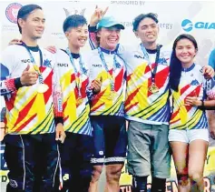  ??  ?? TOP ACHIEVEMEN­T: The two Sabahan champions, Stanly (left) and Natahsya (second left), with fellow overall winners Kazantsev, Eleazar and Ariana at the podium celebratin­g their victories in the Asia Mountain Bike Series 2017.