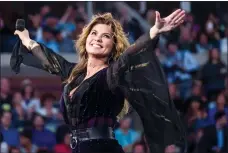  ?? THE CANADIAN PRESS/AP-INVISIONCH­ARLES SYKES ?? Shania Twain performs at the opening night ceremony of the U.S. Open tennis tournament at the USTA Billie Jean King National Tennis Center on Aug. 28 in New York. Twain is reclaiming a position atop the charts with her first studio album in 15 years.