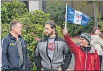  ?? JOE GIBBONS/THE TELEGRAM ?? Federal government workers held a brief lunch-hour demonstrat­ion outside the Sheraton Hotel Newfoundla­nd on Wednesday as federal cabinet ministers were holding meetings inside. Among those voicing their concerns over the Phoenix Payroll System foul-ups...