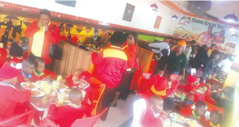  ??  ?? Disney Junior Nursery School pupils enjoy lunch at a local restaurant while celebratin­g the institutio­n's achievemen­ts, among them the recent opening of a second branch in Area 14, Dangamvura