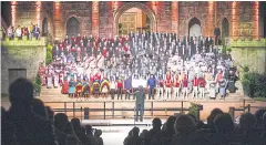  ??  ?? BELOW
The Bangkok Voices join the other participat­ing choirs in the main concert at the open air theatre in Otigheim.