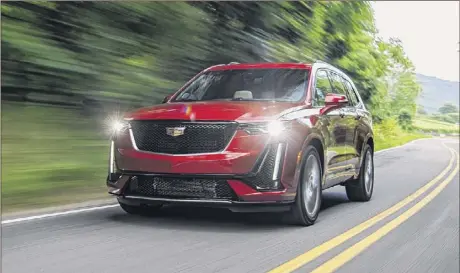  ??  ?? 2021 CADILLAC XT6: Front-wheel-drive is standard, but all-wheel-drive is only a $2,000 option. The Sport trim with AWD adds torque vectoring for more precise cornering.