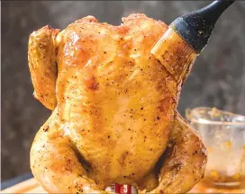  ?? Associated Press photo ?? This undated photo provided by America’s Test Kitchen shows glazed roast chicken in Brookline, Mass.