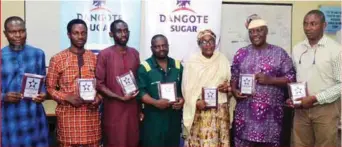  ?? ?? Cross section of Dangote Sugar Refinery Plc 1st quarter 2022 Staff Motivation Award Recipients during the Company’s Staff Motivation Scheme award presentati­on event held at their offices in Apapa Lagos ....