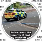  ??  ?? Police record the severity of road accidents