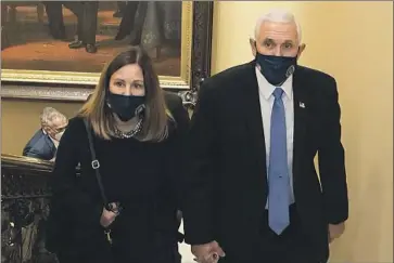  ?? House select Jan. 6 committee ?? THEN-VICE PRESIDENT Mike Pence and wife Karen at the Capitol in an image from video released by the now-disbanded House Jan. 6 committee. His subpoena marks a milestone in the probe related to Jan. 6.