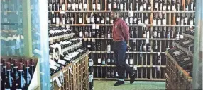  ?? NETFLIX ?? Joe’s Wines & Liquor take a star turn (along with actual star Mamoudou Athie, playing a wine store employee) in “Uncorked.”