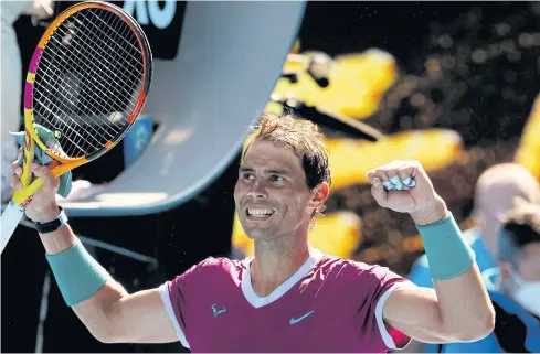  ?? AFP ?? Rafael Nadal celebrates his win against Marcos Giron in the first round of the Australian Open in Melbourne yesterday.