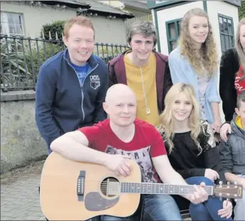  ??  ?? The Conary Music group who recorded 'Falling' from their Luan Parle songwritin­g workshop in aid of W Enniskerry: (L-R) Pauric Dunne, Jacob Smith, Olivia Sheehy, Aine Quirke, Karla Treacy. Front: Bernard F