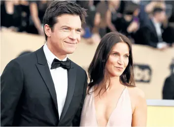  ?? JORDAN STRAUSS/ INVISION ?? Jason Bateman, left, and Amanda Anka arrive at the 24th annual Screen Actors Guild Awards at the Shrine Auditorium & Expo Hall on Jan. 21, in Los Angeles.