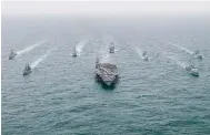 ?? Photo: Handout ?? US, South Korean and Japanese warships on exercise.