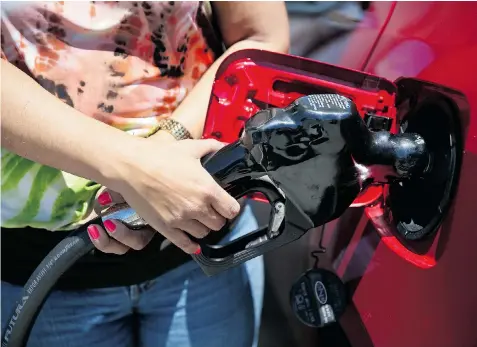  ?? JOE RAEDLE/Getty Images ?? Canada’s current fuel-economy testing process is unrealisti­c but Natural Resources Canada has updated its processes.