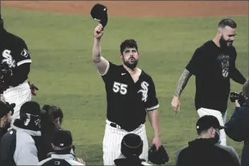  ?? DAVID BANKS/AP ?? CHICAGO WHITE SOX STARTING PITCHER CARLOS RODON (55) celebrates his no hitter against the Cleveland Indians with his teammates in a game on Wednesday in Chicago.