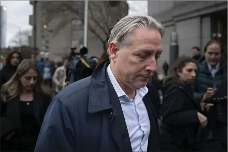  ?? JOHN MINCHILLO — THE ASSOCIATED PRESS ?? Charles McGonigal, former special agent in charge of the FBI’s counterint­elligence division in New York, leaves court in New York last month. The former high-ranking FBI counterint­elligence official has been indicted on charges he helped a Russian oligarch, in violation of U.S. sanctions.
