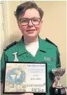  ??  ?? Cadet Joshua Holden with his award