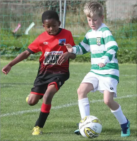  ??  ?? Drogheda Town do battle with Donacarney Celtic in the Under-10 League on Sunday morning.