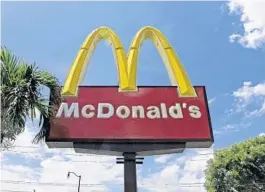  ?? ALAN DIAZ/AP ?? A former McDonald’s employee is suing Verizon and NBCUnivers­al for posting her photo with stories about allegation­s of sexual harassment and abuse at the chain.