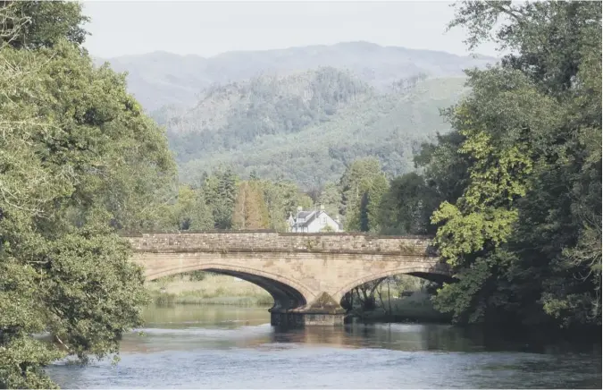  ??  ?? 0 Here’s a serene scene of Red Bridge and River Teith, Callander from Davie Macdonald of Callander.