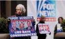  ?? Photograph: Justin Lane/EPA ?? Sandy R, of New York, holds a sign while participat­ing in a protest organized by the group Rise and Resist outside Fox News headquarte­rs in New York on Tuesday.