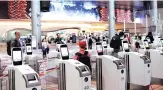  ??  ?? Automated immigratio­n control gates at Changi airport's Terminal 4 in Singapore