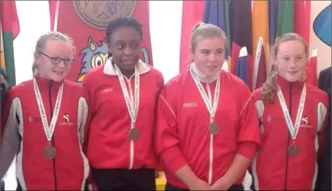  ??  ?? Dundalk St Gerard’s AC’s Patricia Jumbo-Gula (second from left) with Sarah Clarke, Aoibhin McMahon and Hannah Reilly who finished third representi­ng Louth at the National Community Games Finals in Athlone.