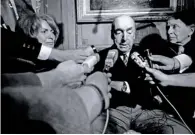  ?? AP file ?? File photo shows Pablo Neruda talking with reporters in Paris after being named the 1971 Nobel Prize for Literature. —