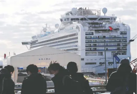  ?? KIM KYUNG-HOON/REUTERS ?? The Diamond Princess waits near Tokyo. Canadians on the ship were told a flight is set to bring them home on Thursday.