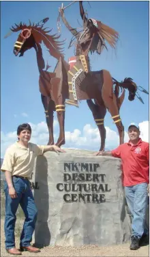  ?? ?? Chief Clarence Louie, left and artist Virgil ‘Smoker’ Marchand with one of his metal sculptures are pictured in this undated photo.