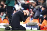  ?? — AFP ?? Manchester City manager Pep Guardiola reacts following a missed penalty during the Uefa Champions League match against Real Madrid.