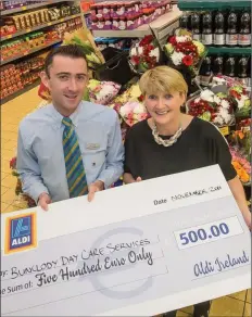  ??  ?? Michael Cloke from Aldi Bunclody and Mairead Keogh, volunteer, Bunclody Day Care Services.