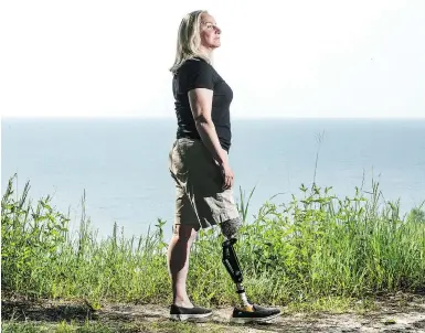  ?? PETER J. THOMPSON / NATIONAL POST ?? Capt. Kimberly Fawcett Smith has been fighting the Canadian Armed Forces for help covering the cost of prosthetic legs, which she needs since a collision on an Ontario highway on-ramp in 2006 that also killed her young son Keiran.