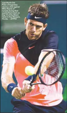  ??  ?? Juan Martin Del Potro of Argentina returns a shot against Milos Raonic of Canada during their quarterfin­al match on Day 10 of the Miami Open in Key Biscayne, Florida. – AFPPIX